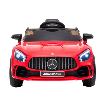 Coche eléctrico para niños Mercedes AMG GT visto de frente en color rojo