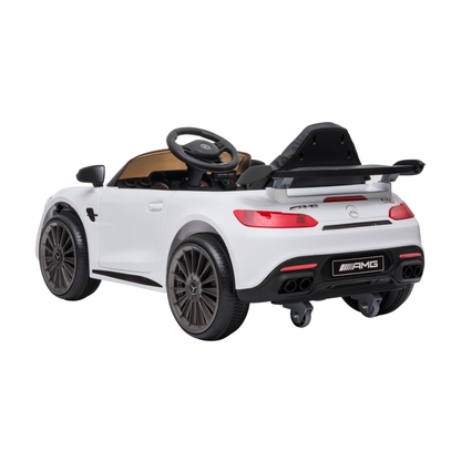 Coche eléctrico para niños Mercedes AMG GT visto en ángulo desde atrás en color blanco