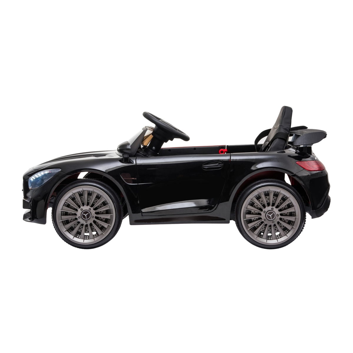 Coche eléctrico para niños Mercedes AMG GT visto de lado en color negro