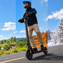 Hombre montando el patinete eléctrico HX D01 por la carretera