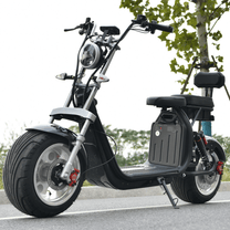 Patinete eléctrico eHoodax X10 City Road visto de lado en la carretera