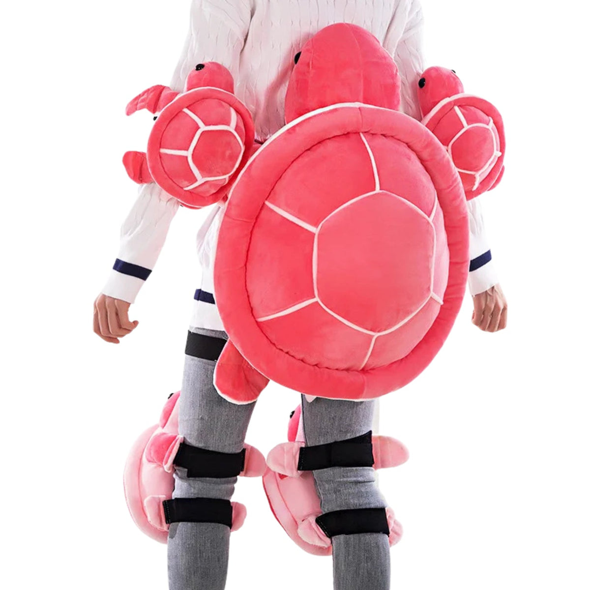 Rodilleras, coderas y protector de cadera Edición Tortuga en rosa en una persona, vista de espaldas