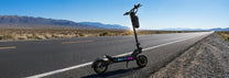 Patinete eléctrico OOTD T10 Pro en vista frontal en ángulo en la carretera
