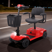Scooter de movilidad SEEDREAM X-02B Lucas con las luces encendidas en un ambiente nocturno
