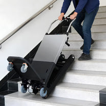 Carretilla eléctrica inteligente para subir escaleras con carga en una escalera