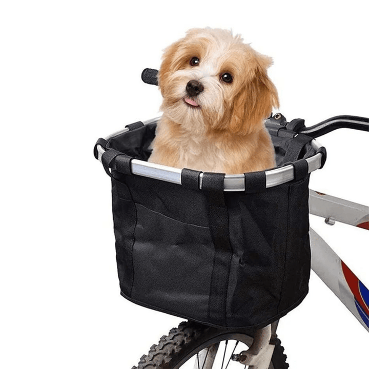 Cesta para perros de manillar con un perro dentro