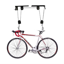 Soporte de techo inteligente para bicicleta con una bicicleta colgada del techo