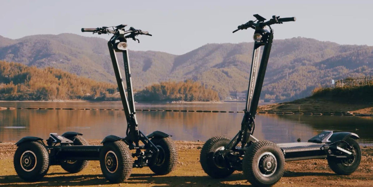 Patinete eléctrico TEVERUN TETRA en vista frontal en ángulo junto a un lago